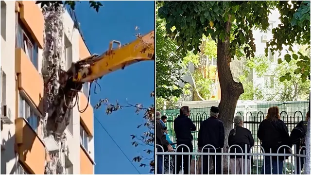 O excavator cu braț galben desface o parte dintr-o clădire, în timp ce un grup de persoane stă în spatele unui gard metalic alb.