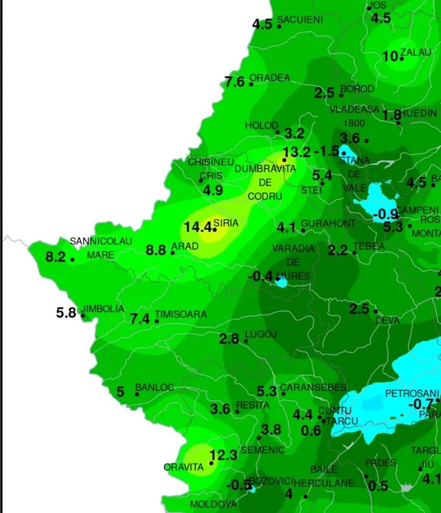 O hartă meteorologică colorată în nuanțe de verde și galben, afișând diverse numere și denumiri de localități pe un fundal cartografic.