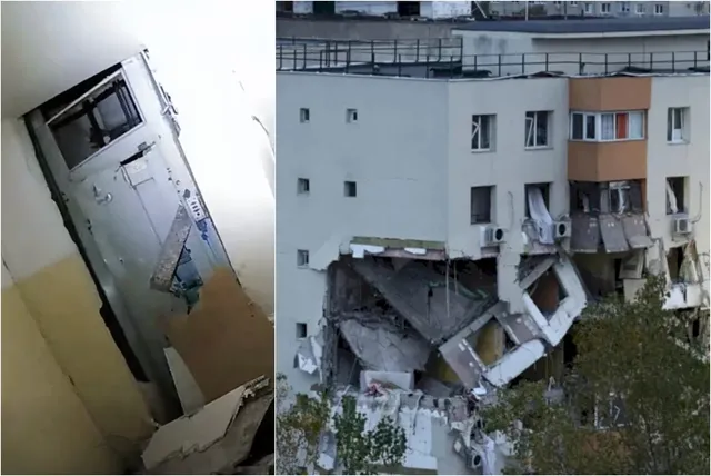 O clădire cu fațadă albă prezintă o secțiune prăbușită între etaje, lăsând la vedere structuri de beton și resturi de pereți în interior.