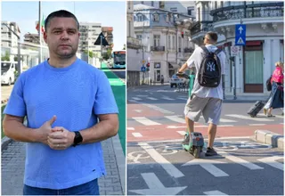 Un bărbat cu un rucsac negru stă pe o trotinetă electrică verde pe o stradă urbană lângă o marcaj rutier albă.