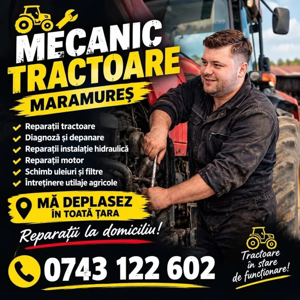 Un bărbat cu haine de lucru murdare de ulei lucrează la un tractor roșu în exterior.