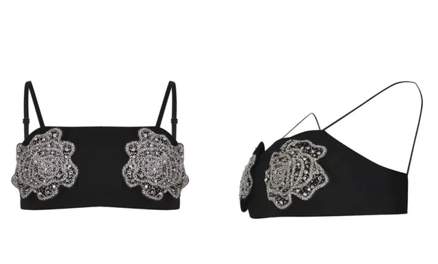 Două obiecte de culoare neagră, decorate cu motive florale argintii strălucitoare, sunt prezentate pe un fundal alb.