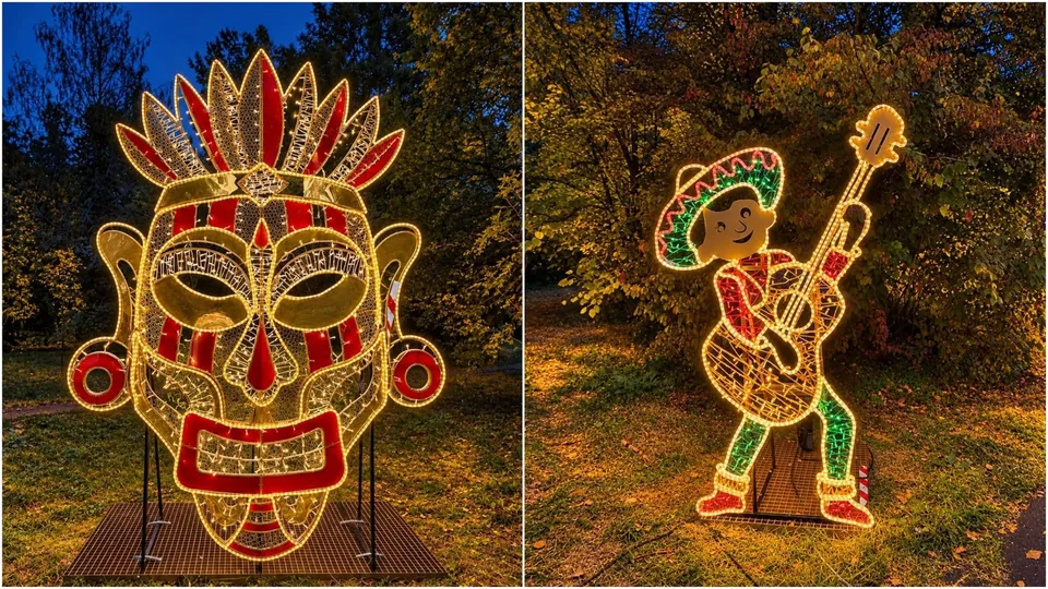 Două instalații luminoase de tip decorativ sunt amplasate pe iarbă, reprezentând o mască cu pene și un personaj care cântă la chitară.