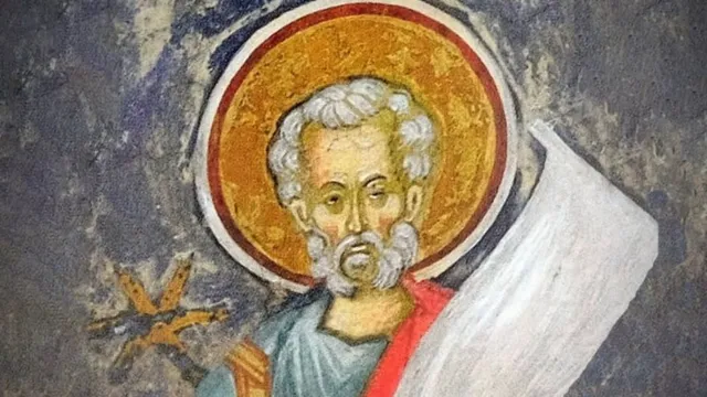 Pictură religioasă reprezentând un bărbat cu barbă și aură, purtând haine albastre și roșii, ținând un pergament alb.