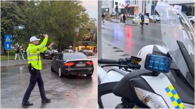Un polițist cu vestă reflectorizantă verde reglează traficul pe un drum umed lângă mașini, în timp ce în partea dreaptă apare un paravânt de motocicletă.