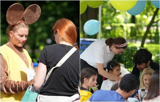 O femeie costumată și o femeie cu părul roșcat stau în parc, în timp ce în partea dreaptă un grup de adulți și copii stau la o masă.