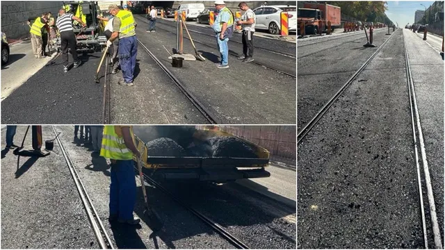 O echipă de lucrători în veste reflectorizante toarnă asfalt pe o suprafață între două șine de tramvai sub lumina soarelui.