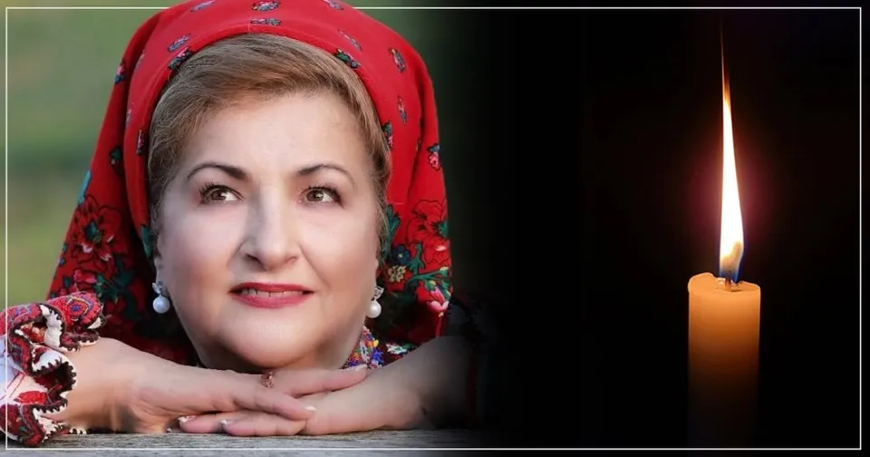 O femeie cu un basma roșie și o lumânare aprinsă sunt prezentate pe un fundal întunecat.