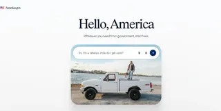 Un text pe fundal alb prezintă mesajul Hello, America, sub care se află un câmp de căutare și o fotografie cu un camion alb pe malul mării.