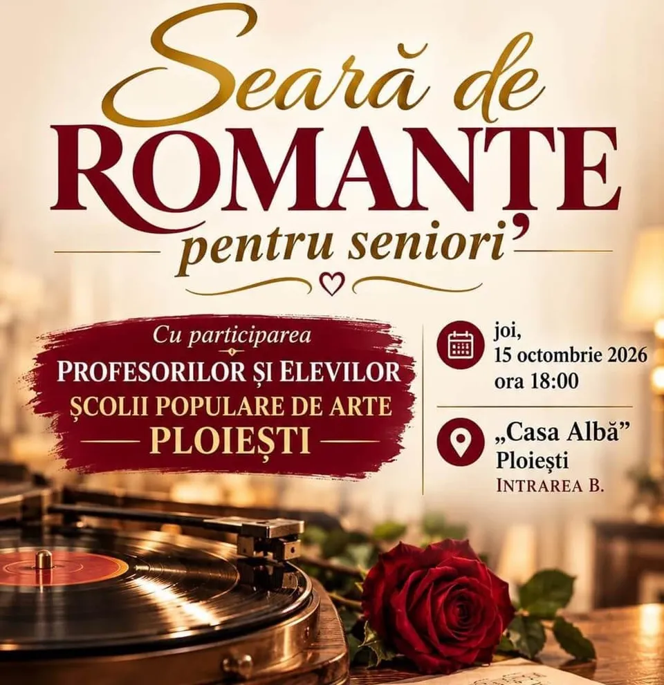 Un gramofon cu un disc negru este așezat pe o masă lângă o trandafir roșu înflorit.
