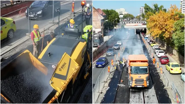 O mașină de asfaltat galbenă descarcă material pe o stradă, în timp ce un camion portocaliu și mașini circulă pe o porțiune de drum asfaltat.