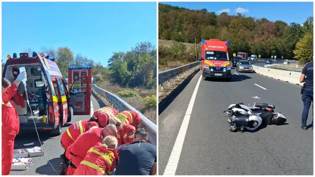 O motocicletă neagră și albă este întinsă pe asfaltul unei drumuri, lângă un vehicul de pompieri și un agent de poliție.