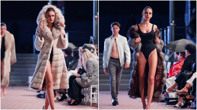 Patru modele defilează pe o pistă de catwalk, purtând diverse haine, în timp ce un public stă așezat pe scaune în fundal.