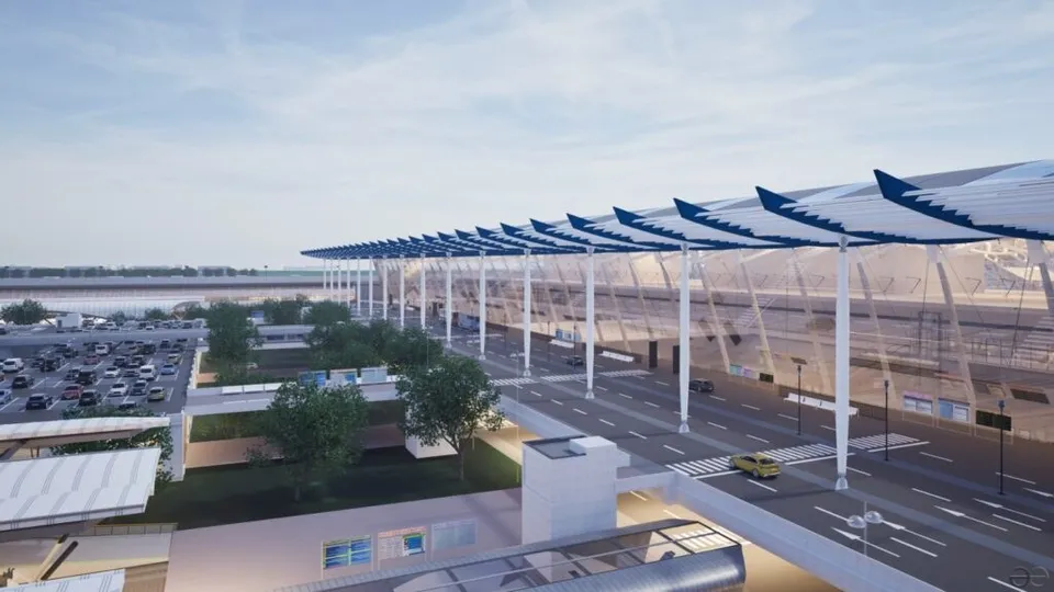 O reprezentare digitală a unui terminal de aeroport cu acoperișuri albastre și albe, o autostradă și un parcare cu mașini sub un cer senin.