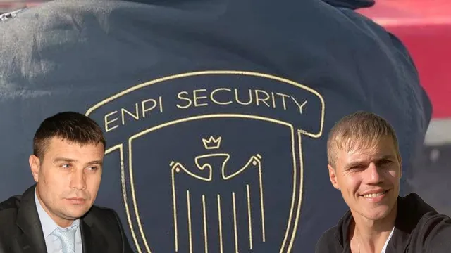 Un bărbat cu păr scurt și o veste neagră stau în fața unui obiect mare pe care este imprimat un logo cu textul ENPI SECURITY.