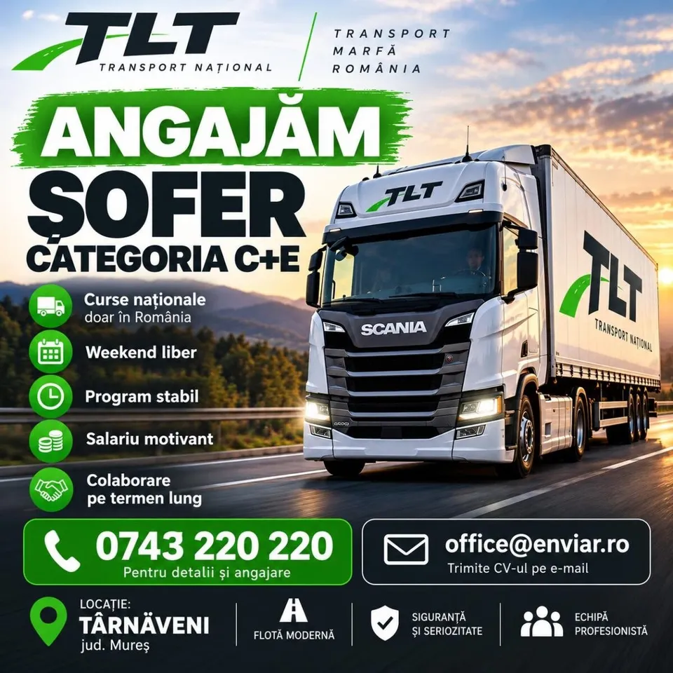 Un camion alb Scania cu remorcă transportă marfă pe un drum, sub un cer cu nuanțe de apus.
