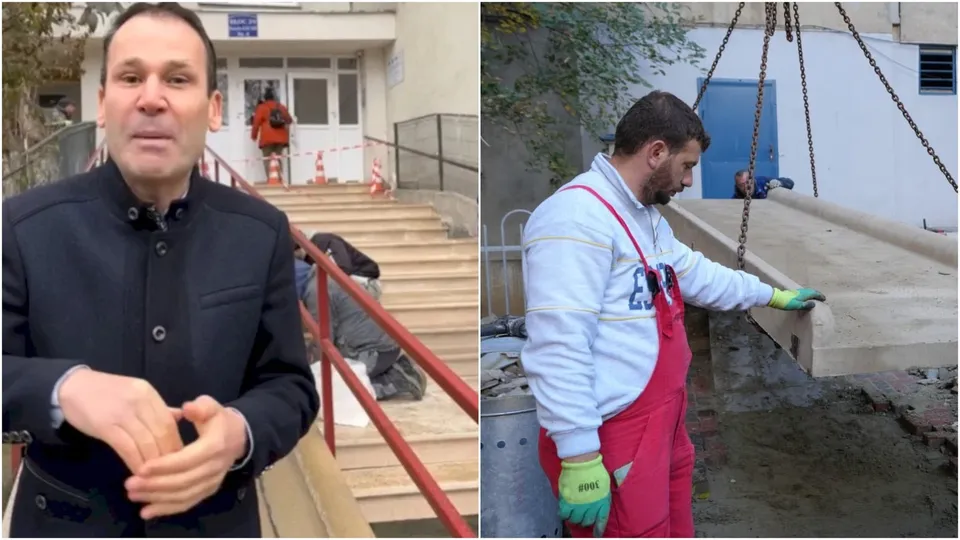 Un bărbat în haine negre stă în prim-plan, în timp ce în fundal un alt bărbat lucrează la scări și un muncitor manipulează o rampă de beton.
