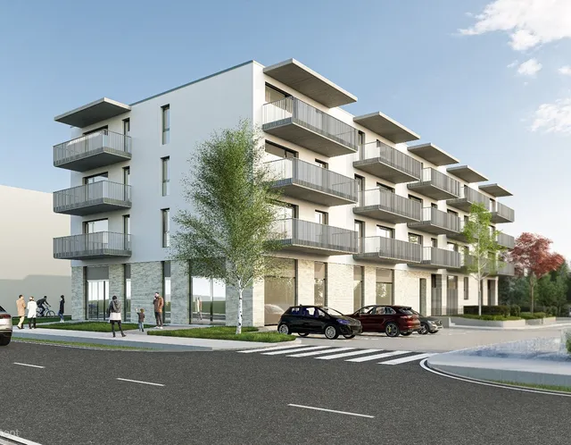 O randare arhitecturală prezintă un bloc de apartamente alb cu balcoane gri, situat lângă un drum asfaltat cu mașini parcate și câteva persoane.
