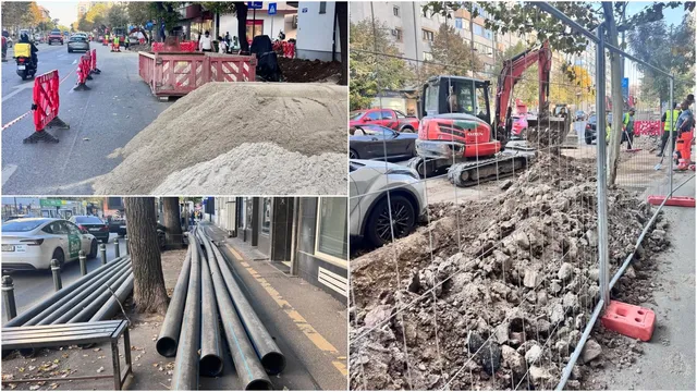 Un excavator roșu lucrează lângă un munte de pietriș și resturi de beton, fiind delimitat de un gard de sârmă și bariere de protecție.
