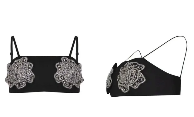 Două obiecte de lenjerie negre, decorate cu motive florale argintii strălucitoare, sunt prezentate pe un fundal alb.