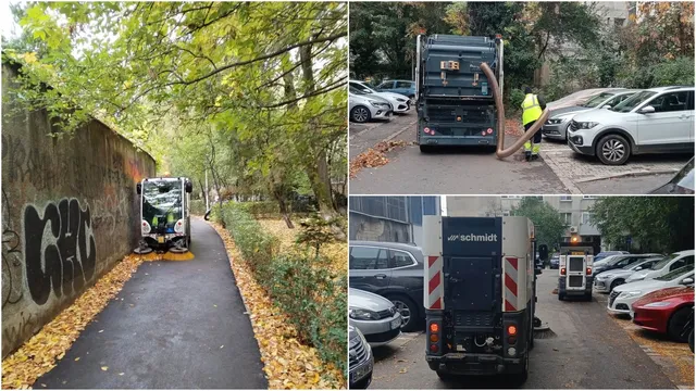 Un vehicul de salubrizare este parcat pe un drum îngust lângă un gard cu graffiti, în timp ce un lucrător poartă vestă reflectorizantă.