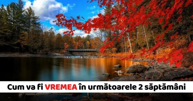 O ramură cu frunze roșii de arțar în prim-plan deasupra unui lac calm, cu pădure și un pod mic în fundal sub un cer înnorat.