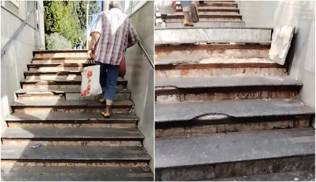 O persoană cu un sac de cumpărături coboară o scară de beton deteriorată, unde treptele prezintă suprafețe lipsă și fragmente de material desprins.
